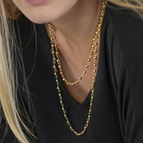 Collana Vestopazzo lunga con a piccole sfere